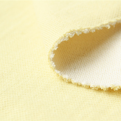 Le double méta Aramid du côté 50% Para Aramid 50% a tricoté le tissu cru pour les gants coupés de résistance