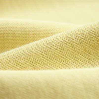 Le double méta Aramid du côté 50% Para Aramid 50% a tricoté le tissu cru pour les gants coupés de résistance